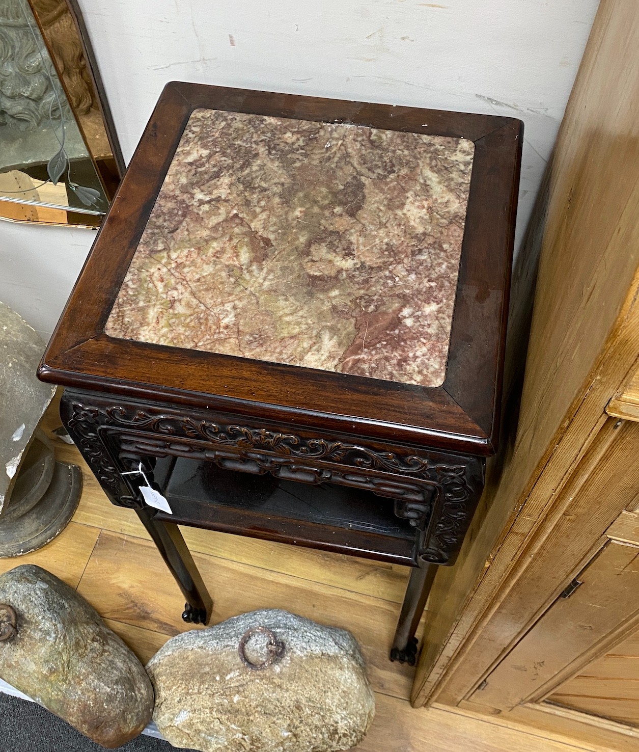 A 19th century Chinese marble inset hardwood jardiniere stand, width 42cm, height 87cm